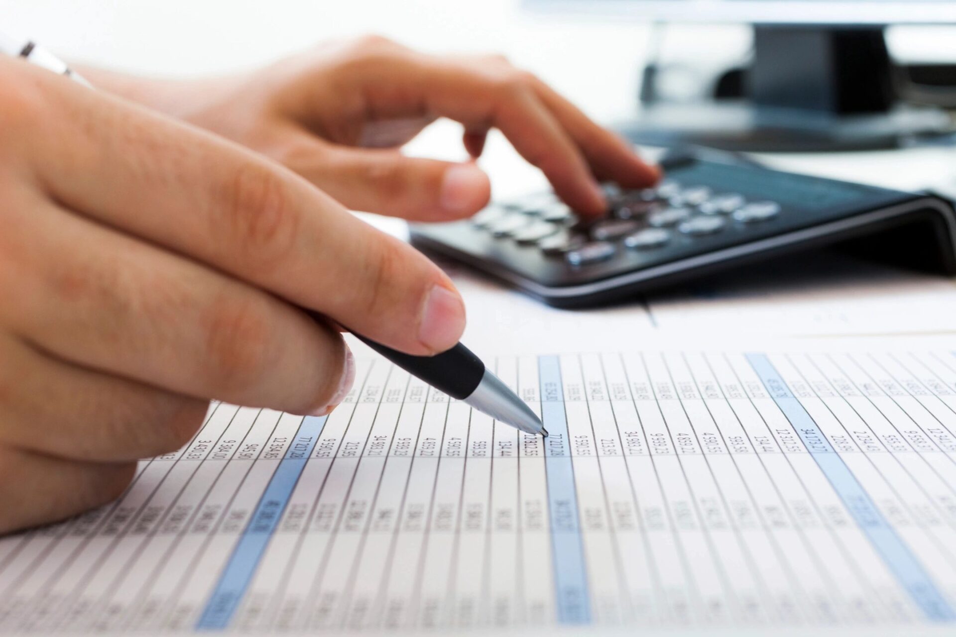 Accountant checking numbers on a document